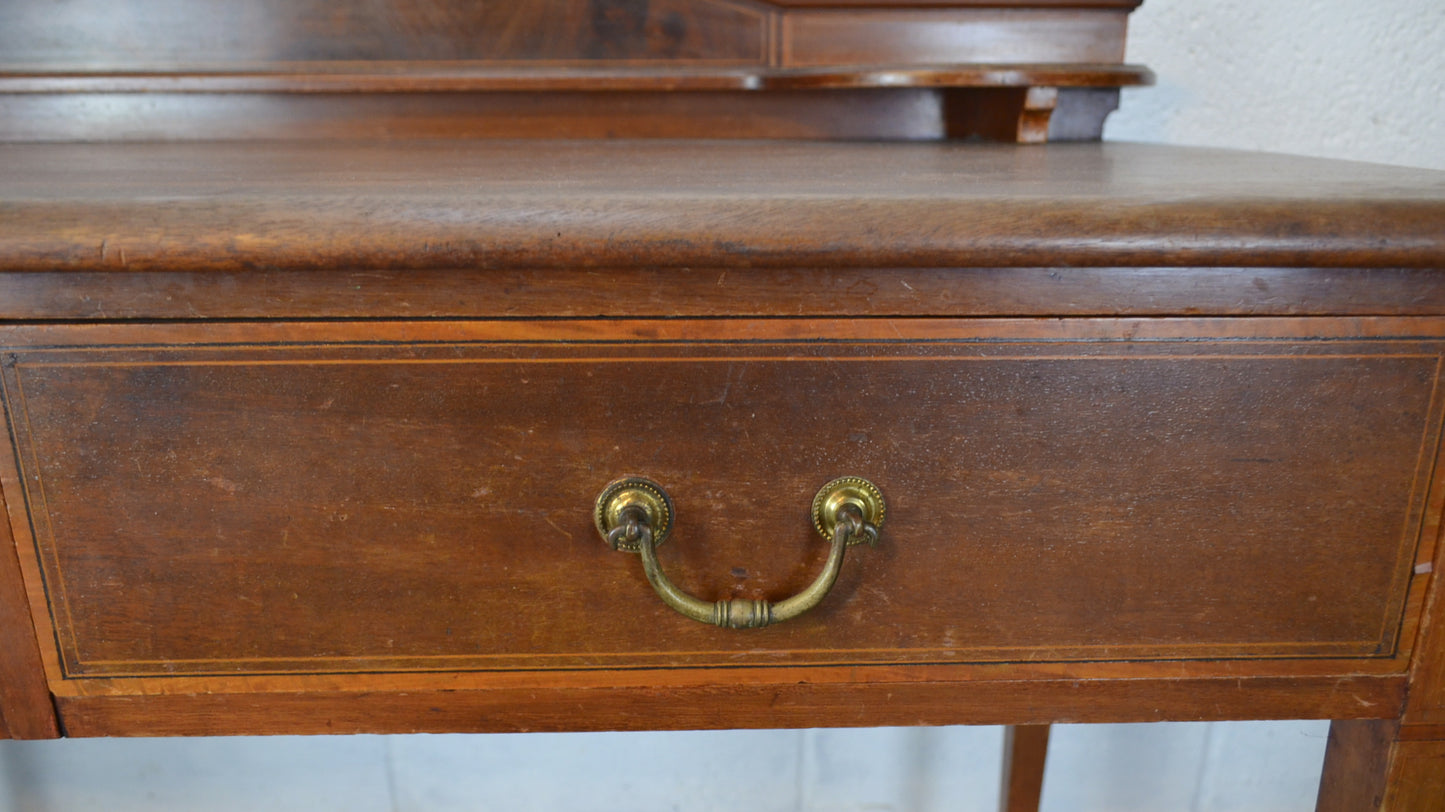 An Antique Desk by Maple & Co