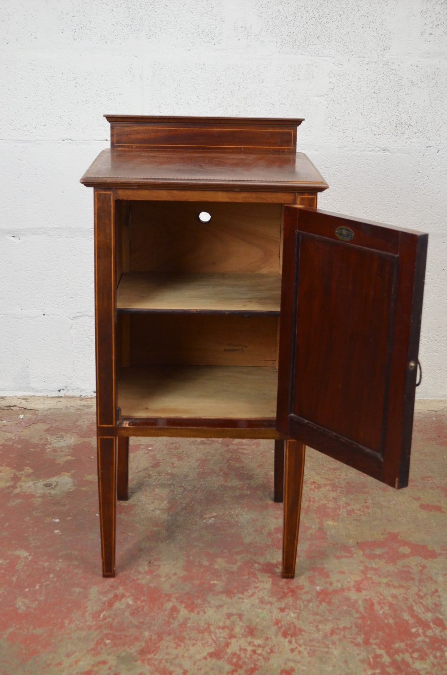An Edwardian Mahogany Bedside Cabinet by Maple & Co