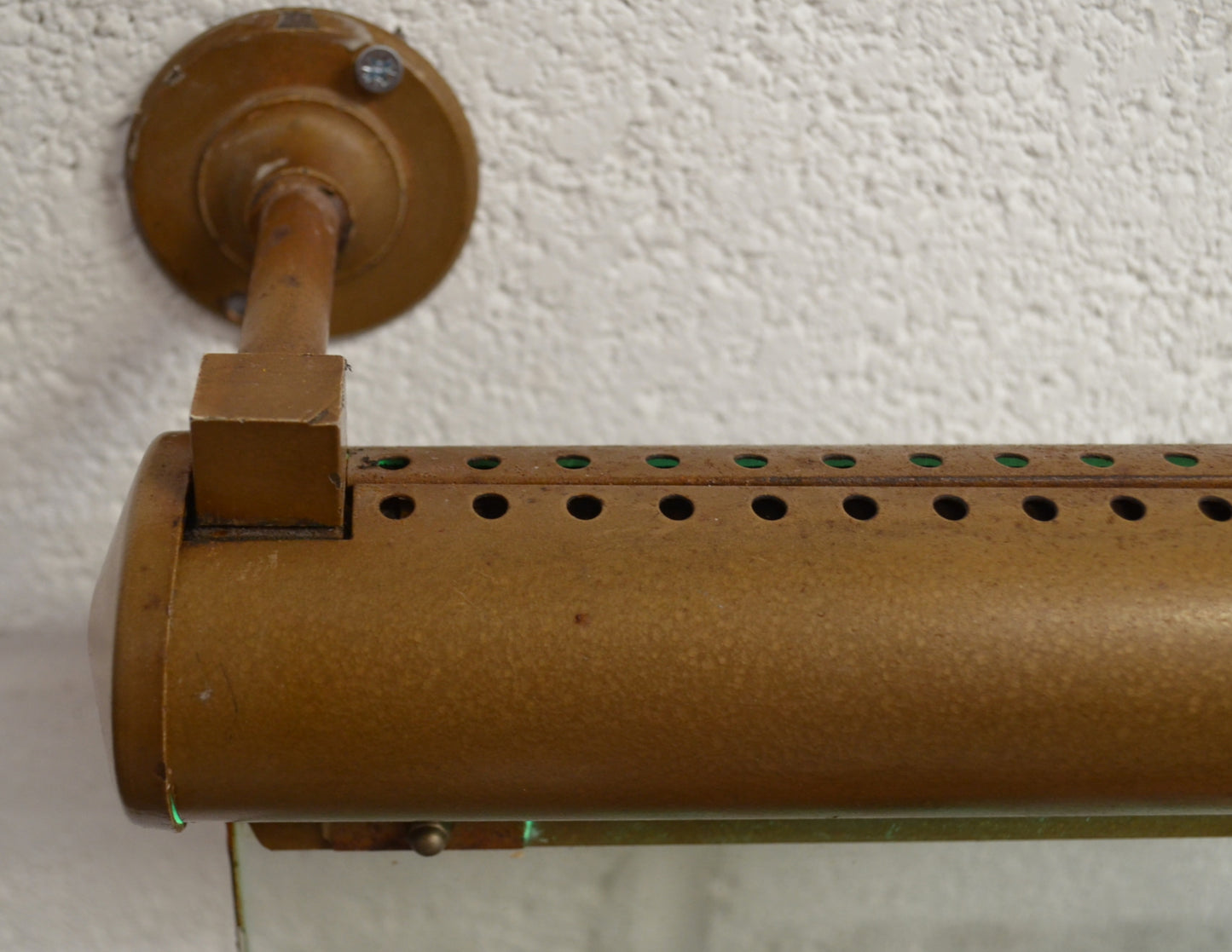 A CLOAKROOM illuminated 'Internalite' directional sign