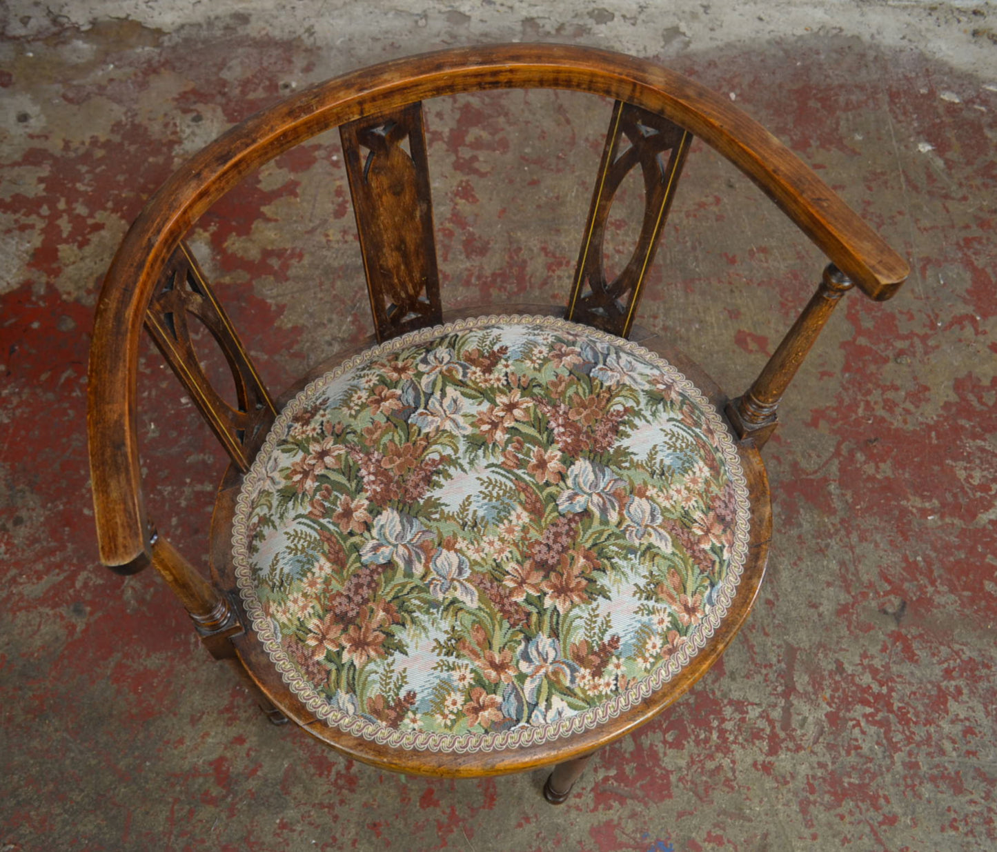 An Edwardian Bentwood Corner Chair