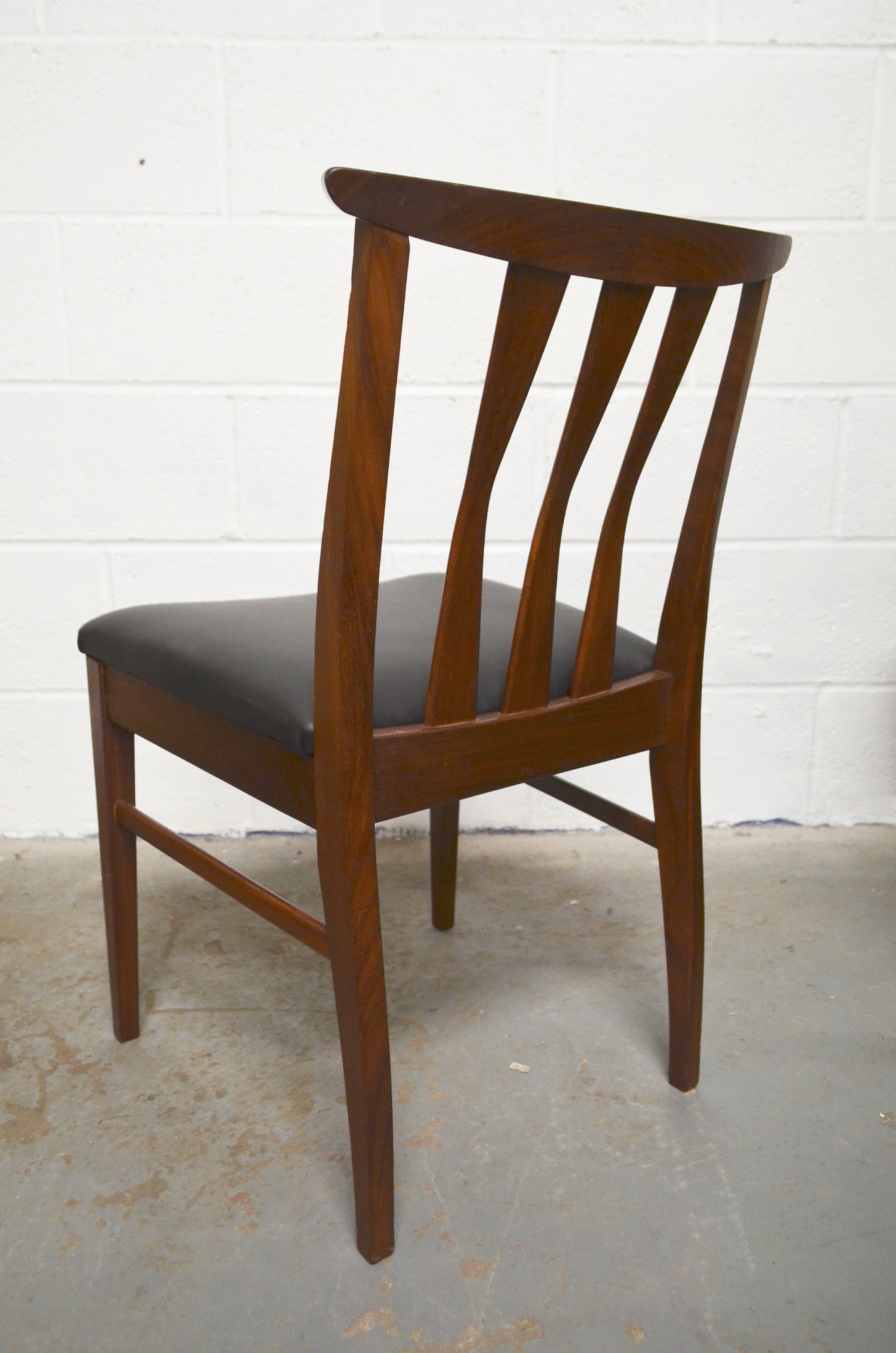 A Set Of Four Vintage Dining Chairs