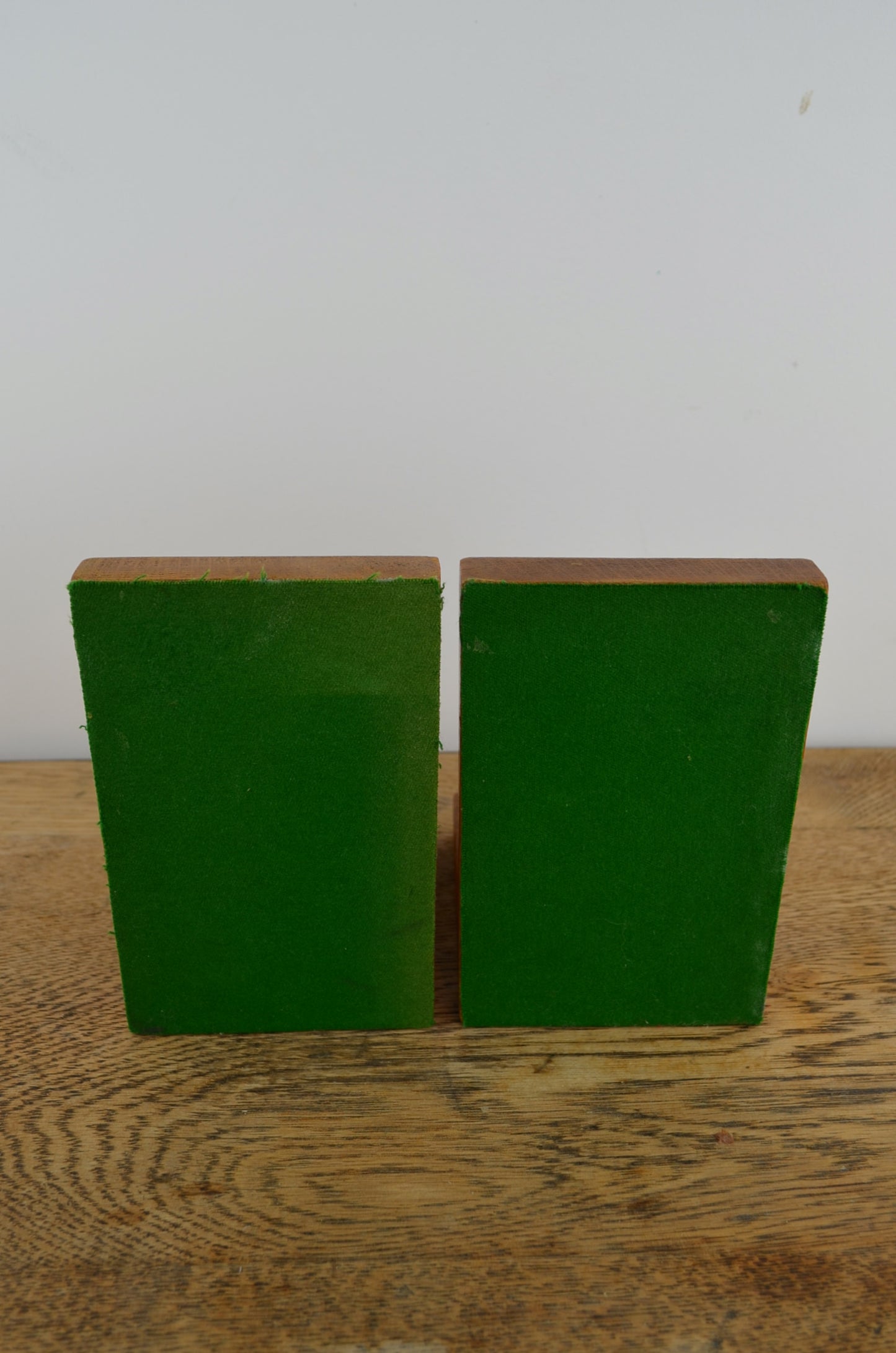 Handmade oak bookends with cricket balls