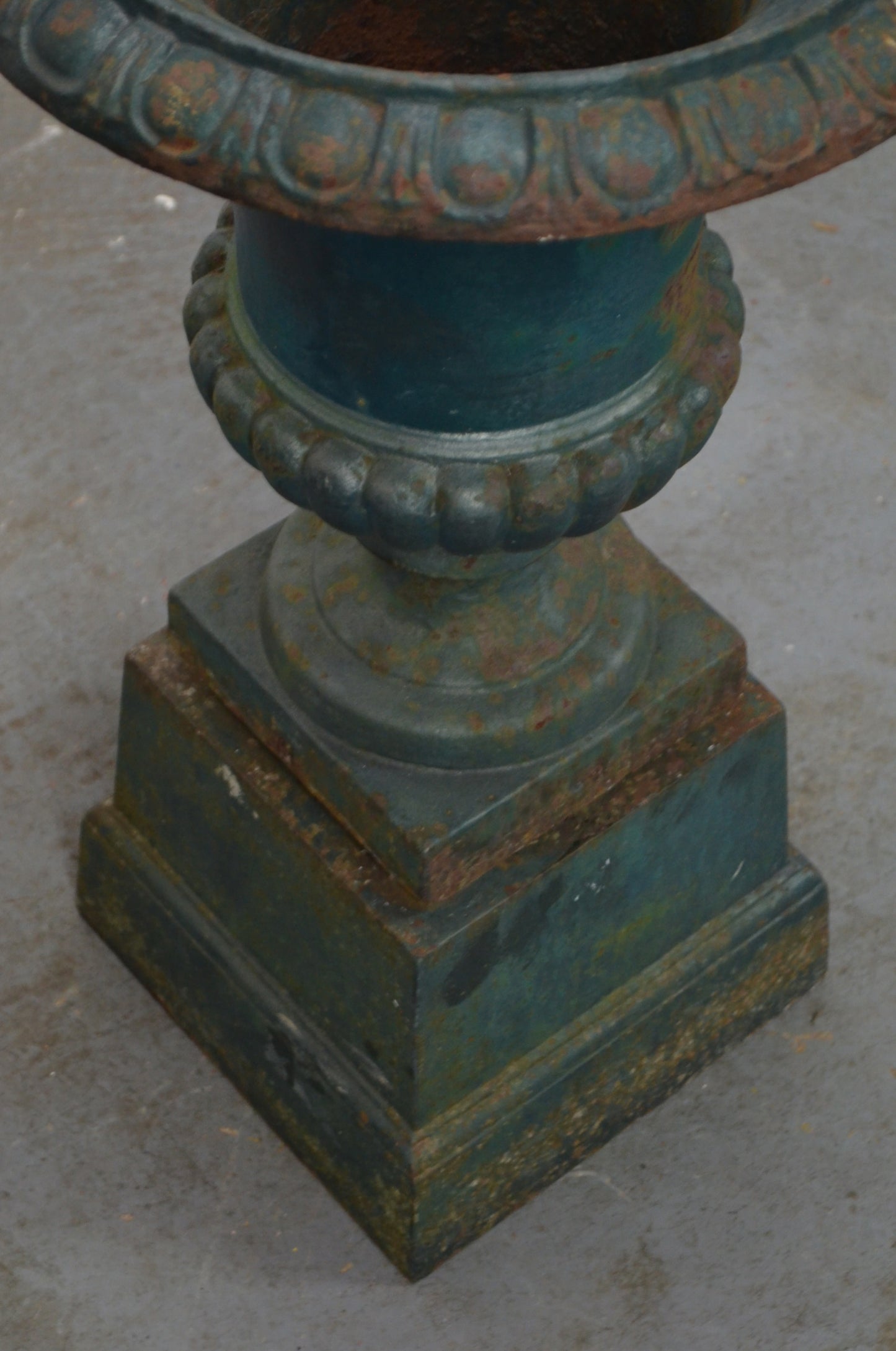 An Antique Urn On Plinth Base