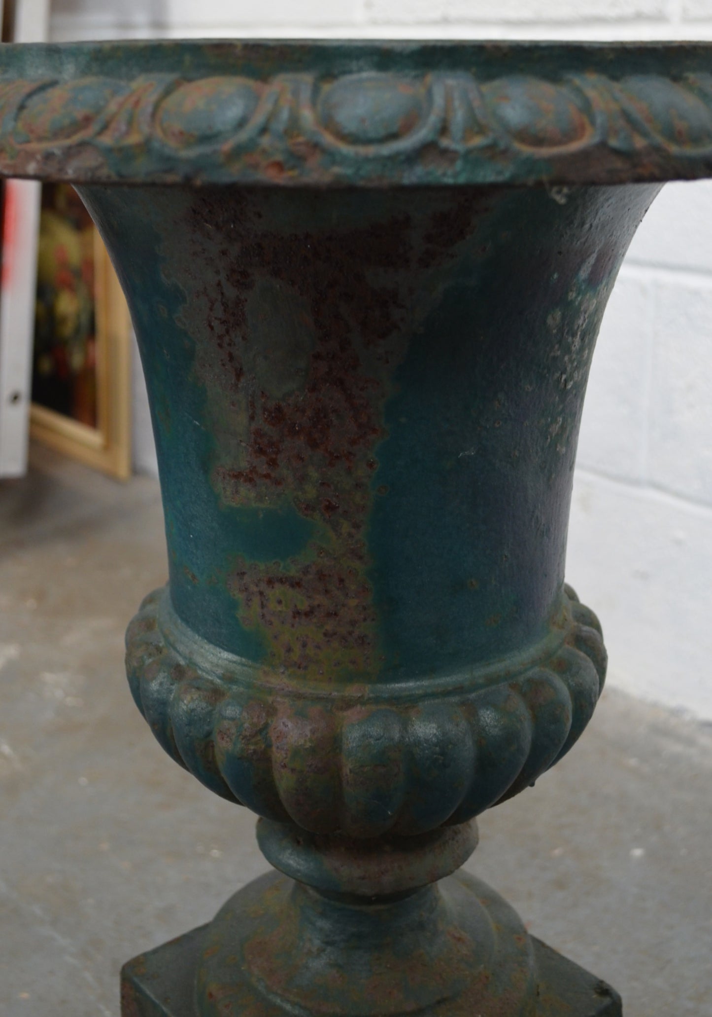 An Antique Urn On Plinth Base