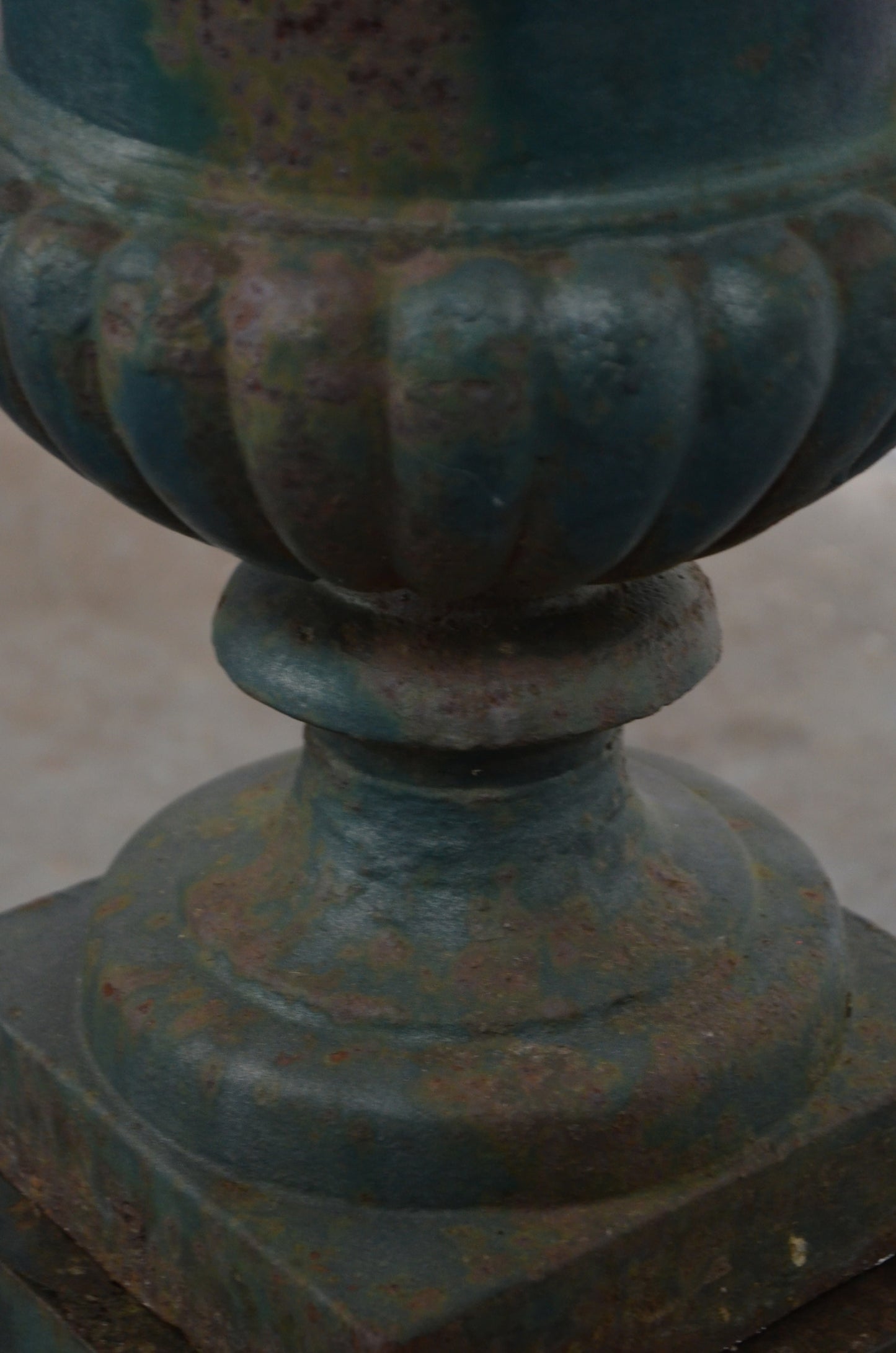 An Antique Urn On Plinth Base