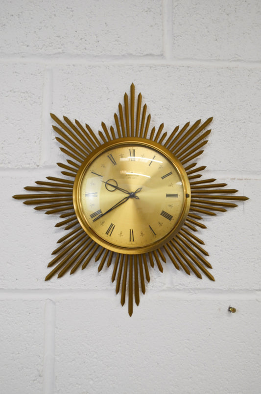 A Vintage Sunburst Wall Clock