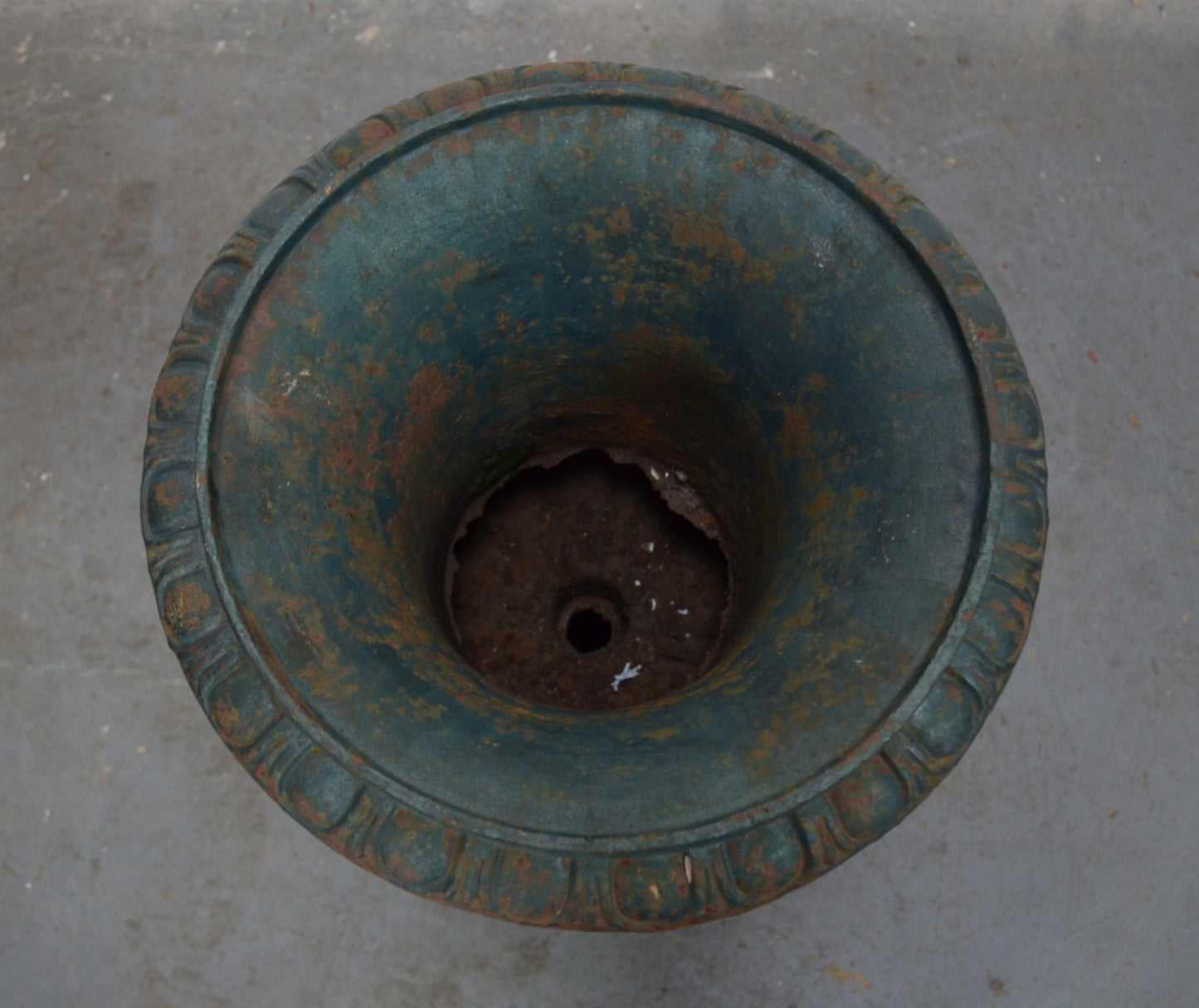 An Antique Urn On Plinth Base