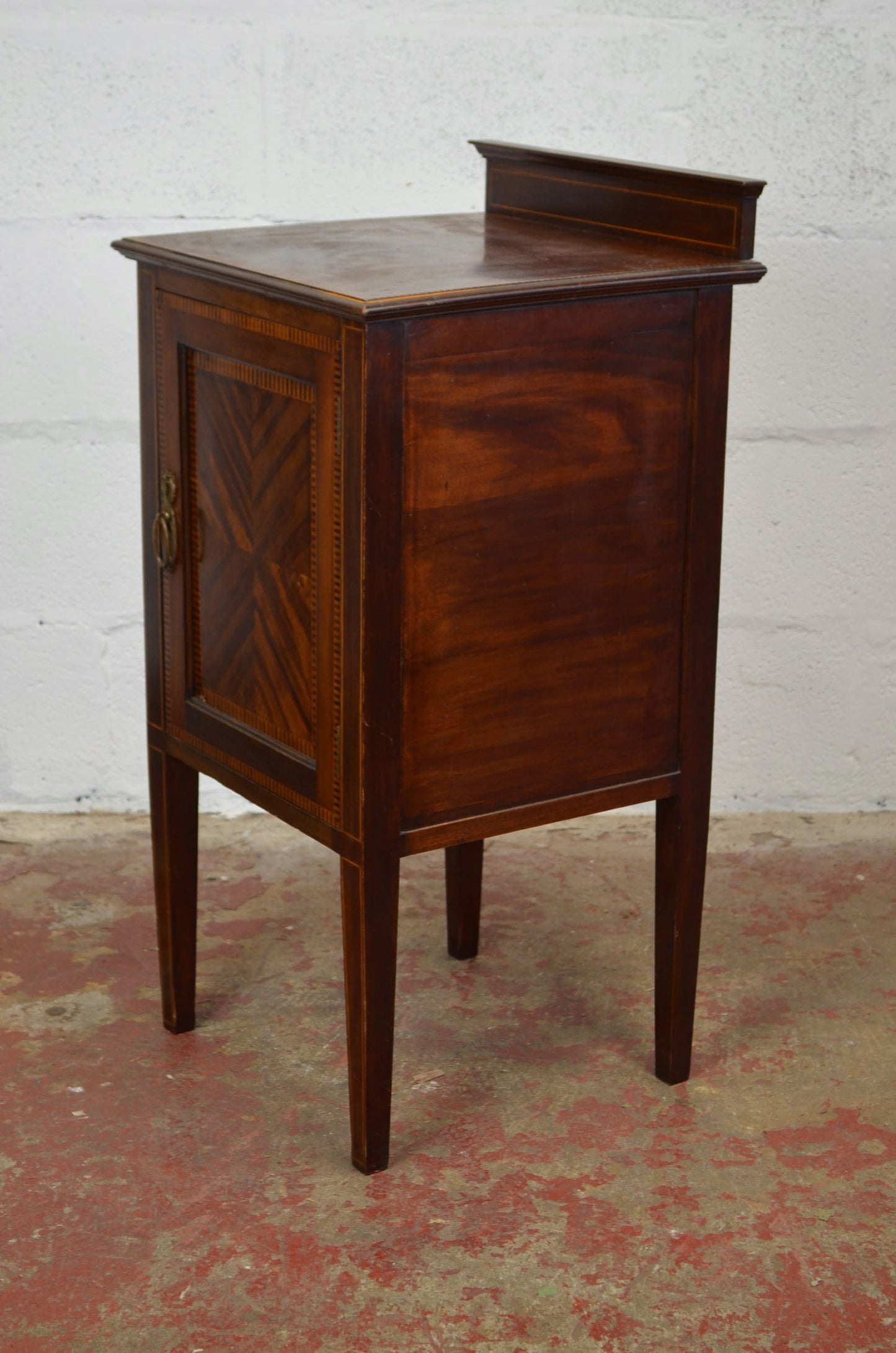 An Edwardian Mahogany Bedside Cabinet by Maple & Co