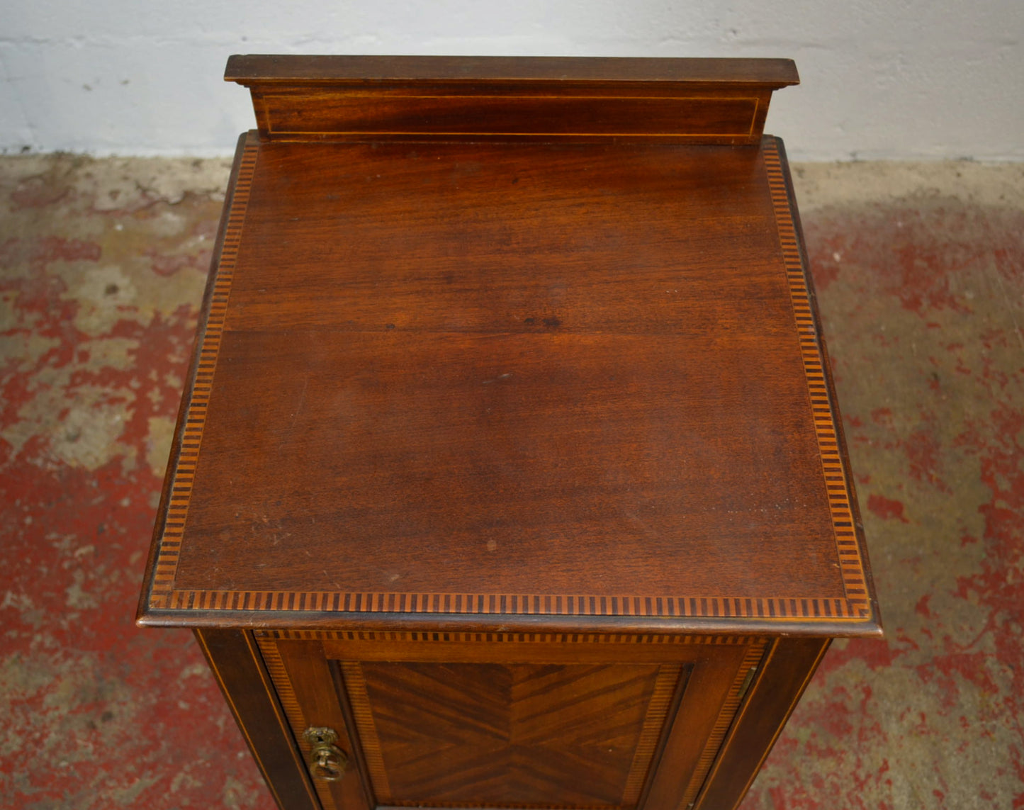 An Edwardian Mahogany Bedside Cabinet by Maple & Co