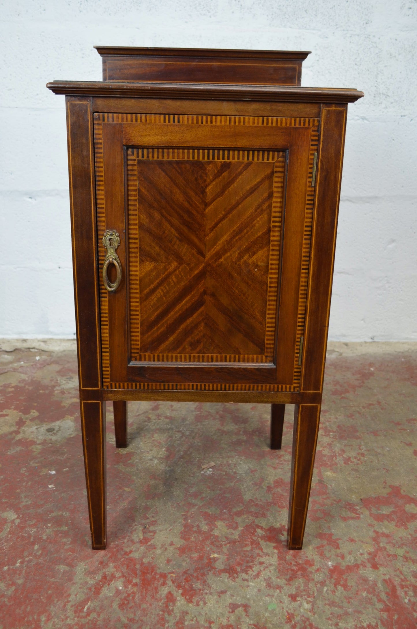 An Edwardian Mahogany Bedside Cabinet by Maple & Co