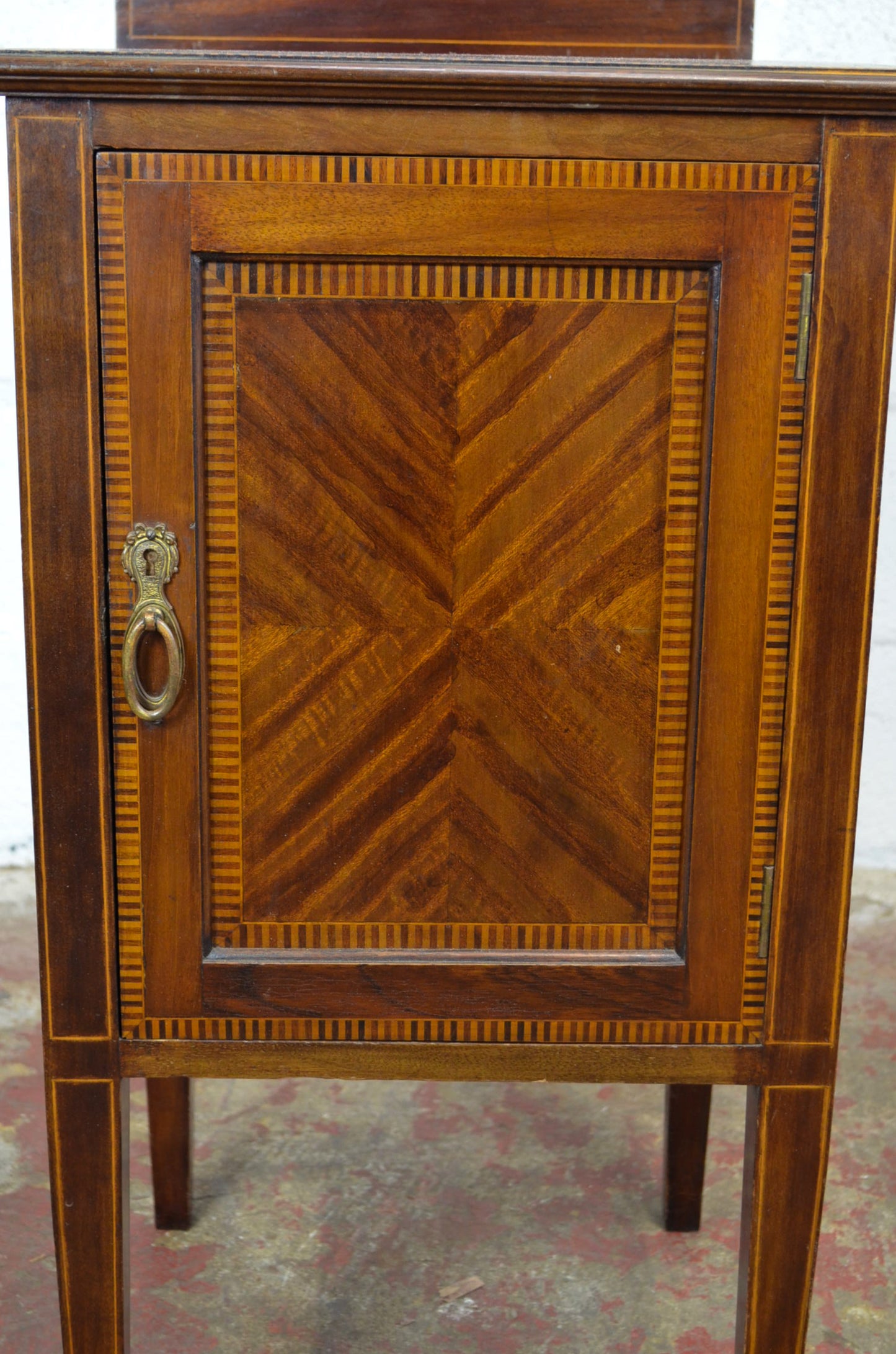 An Edwardian Mahogany Bedside Cabinet by Maple & Co