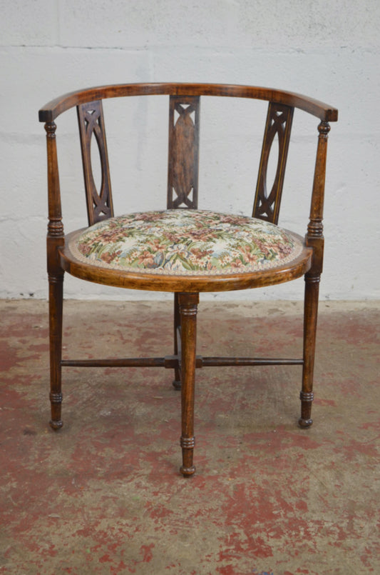 An Edwardian Bentwood Corner Chair