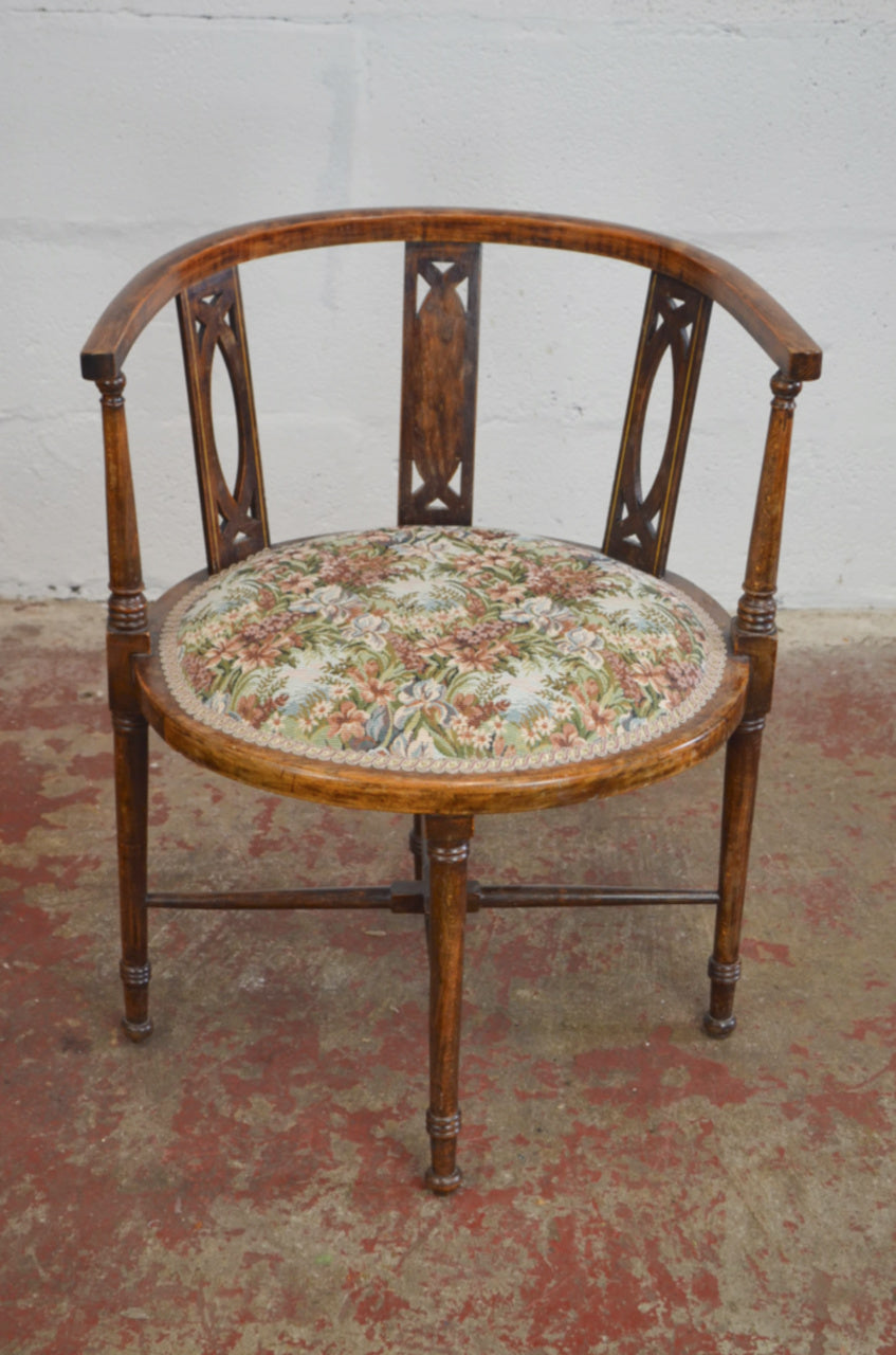 An Edwardian Bentwood Corner Chair