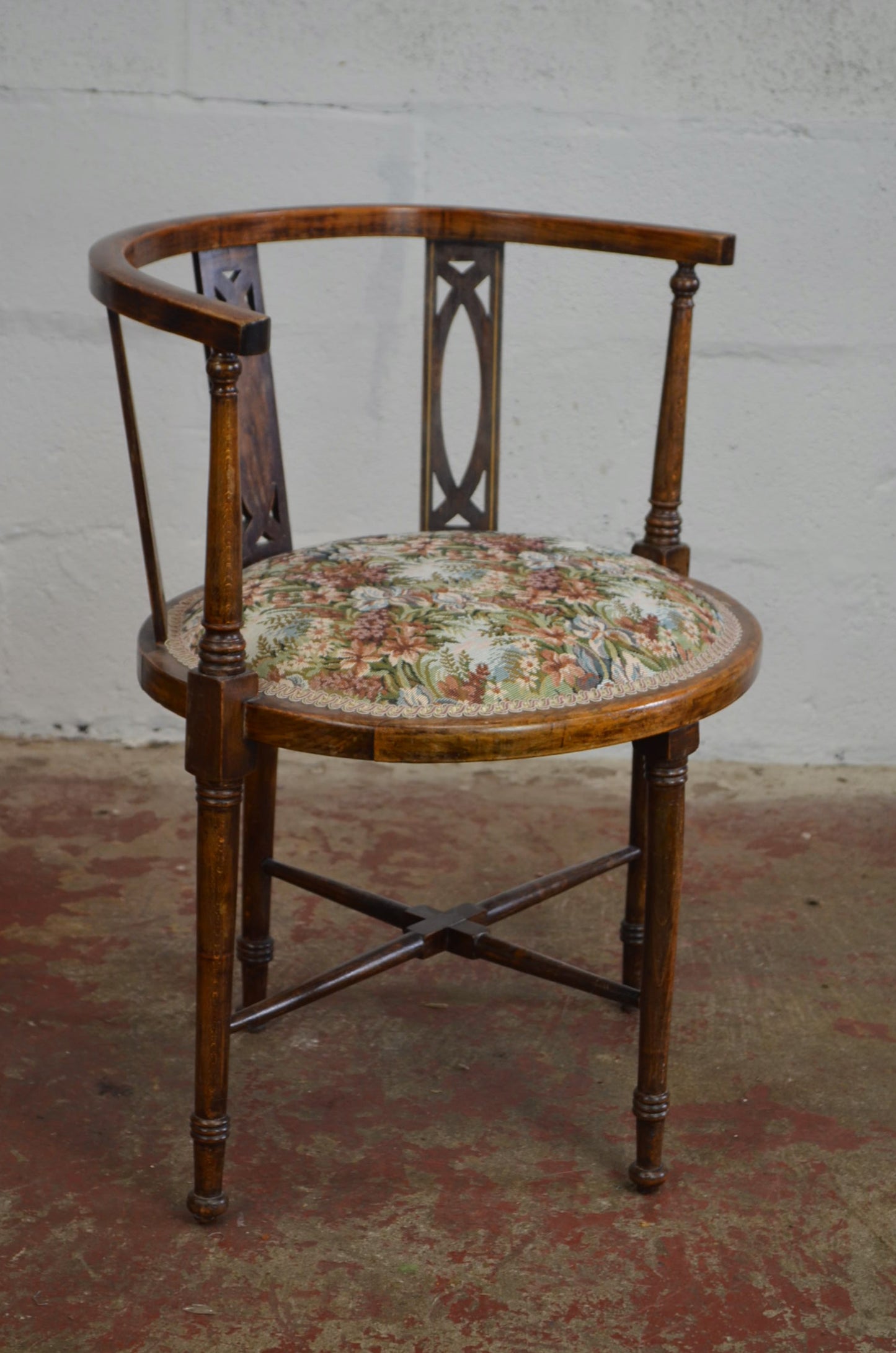 An Edwardian Bentwood Corner Chair