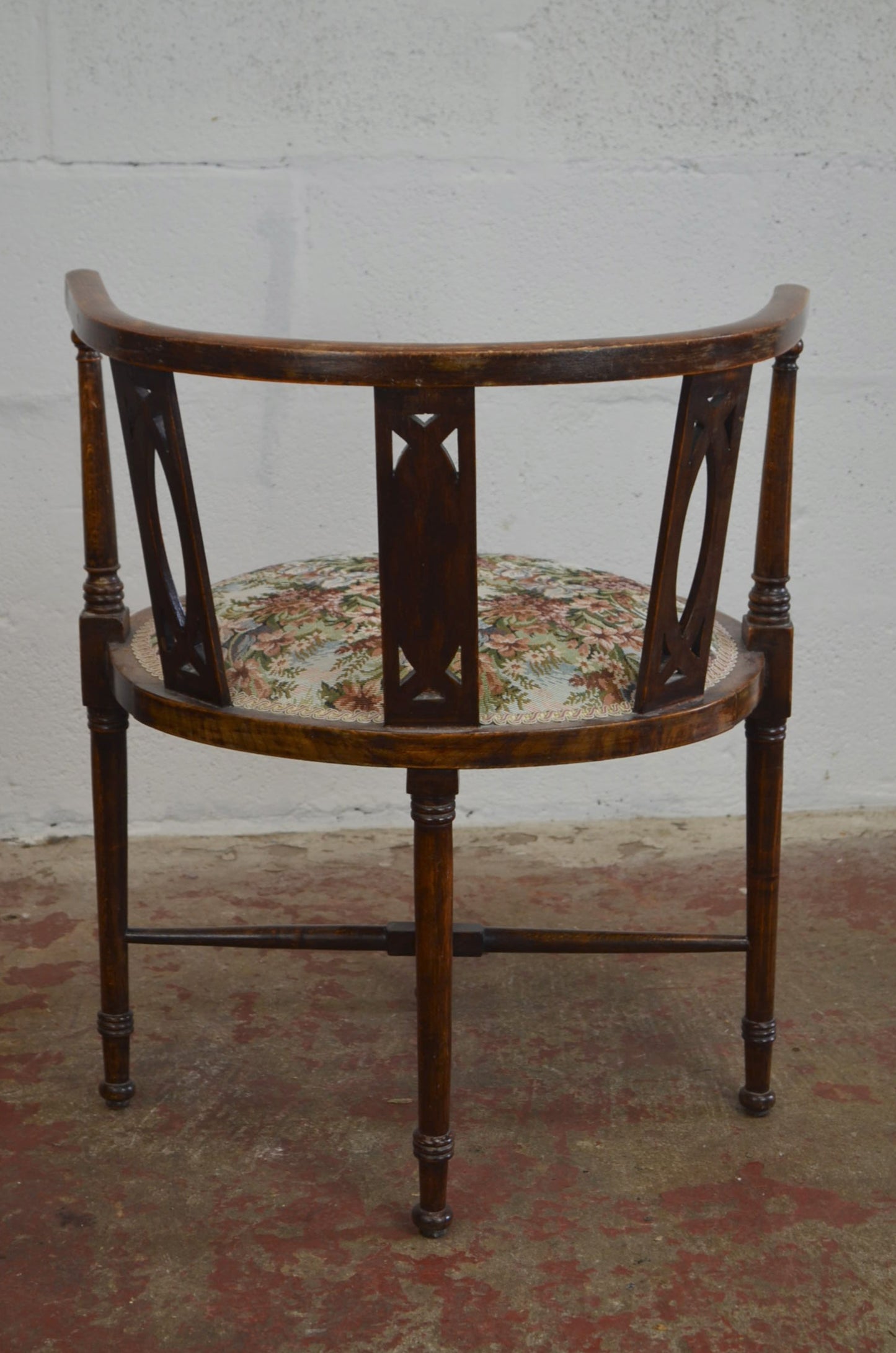 An Edwardian Bentwood Corner Chair