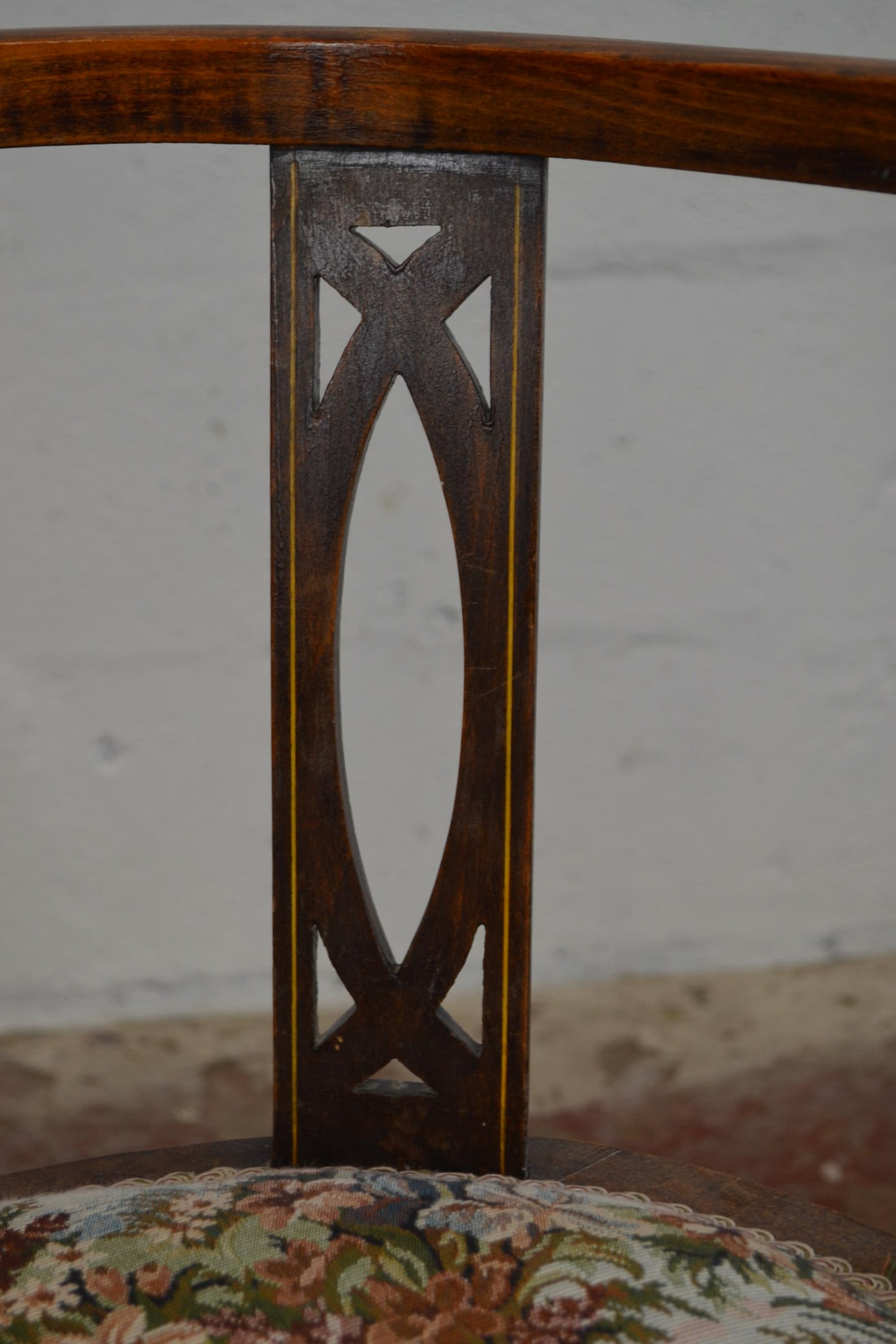 An Edwardian Bentwood Corner Chair