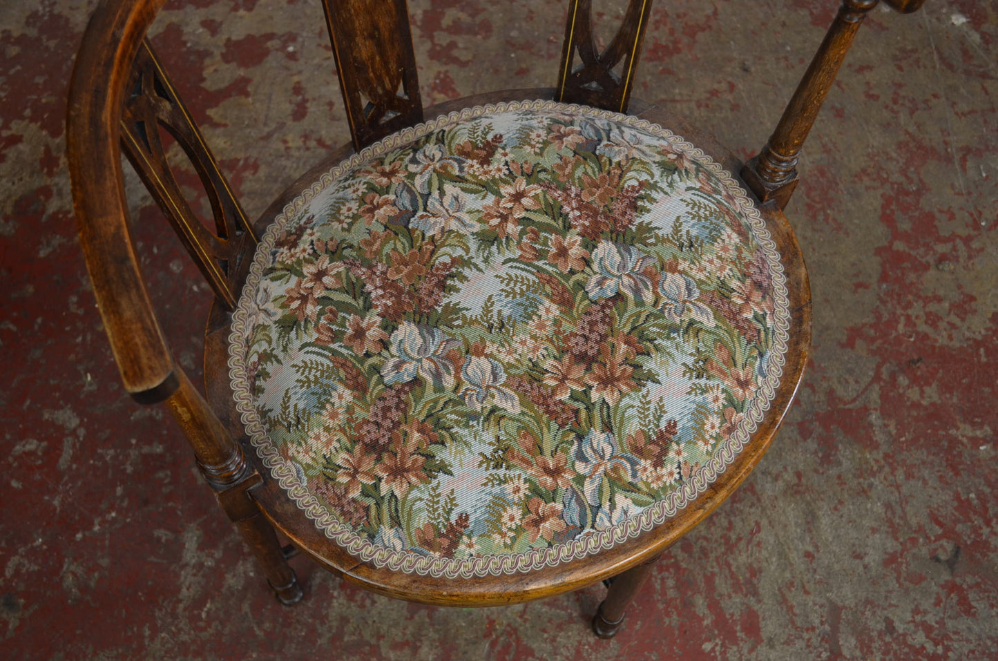An Edwardian Bentwood Corner Chair