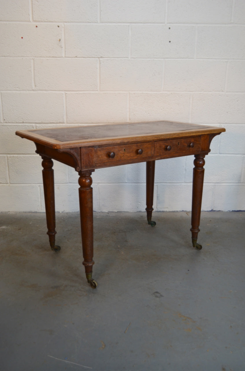 An Antique Writing Desk by Maple & Co