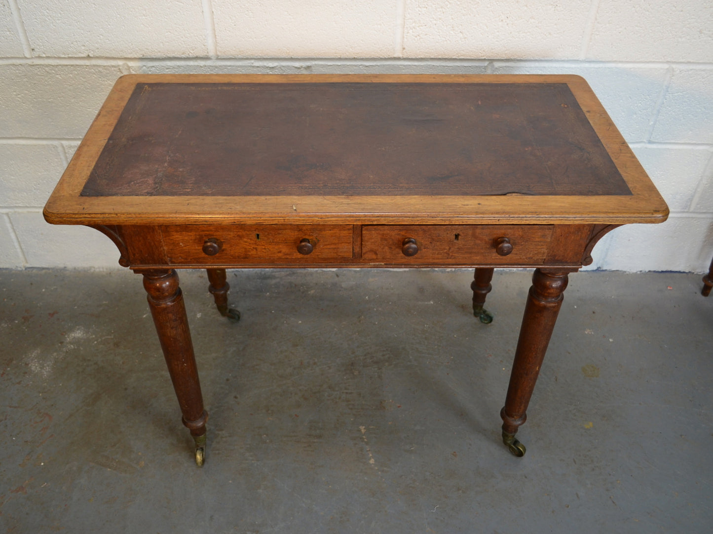 An Antique Writing Desk by Maple & Co