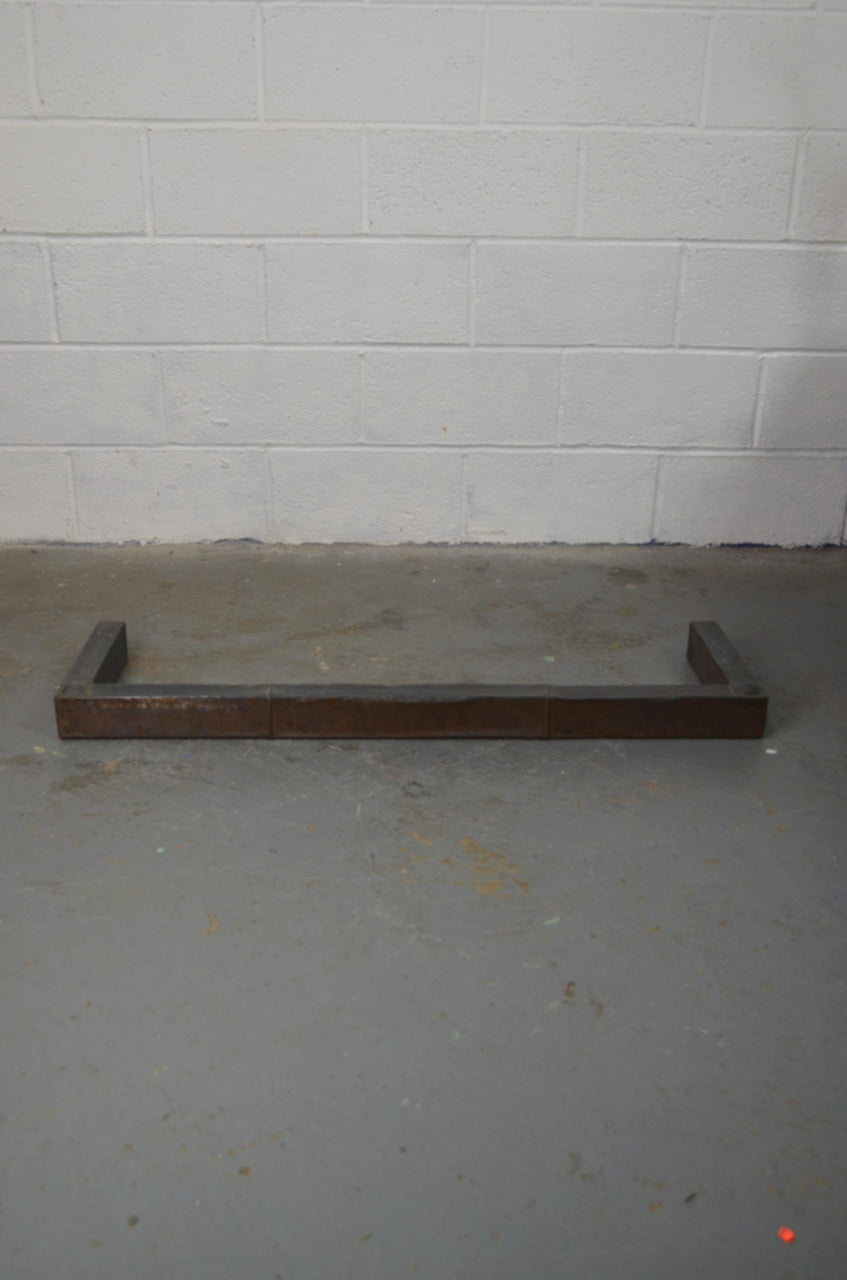 An Arts & Crafts Copper Fire Curb Fender