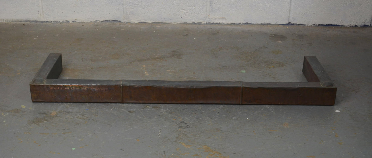 An Arts & Crafts Copper Fire Curb Fender