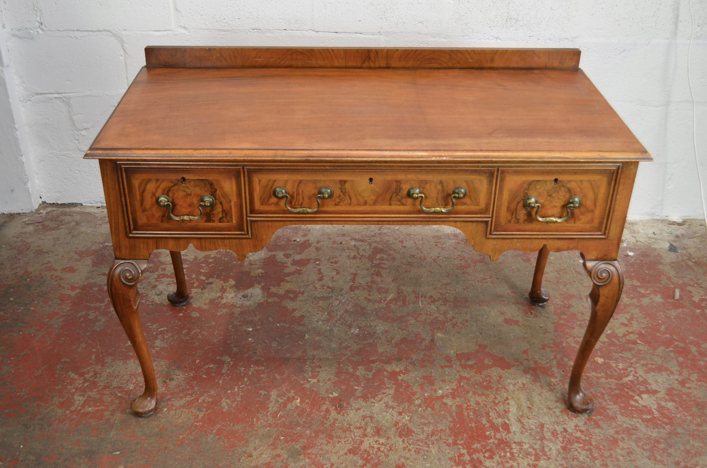 Waring & Gillow - A Queen Anne Revival Walnut Writing Table Desk