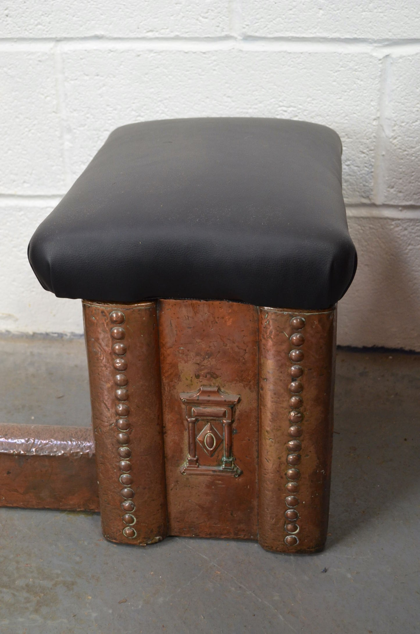 An Arts & Crafts Copper Club Fender With Georgian Footman