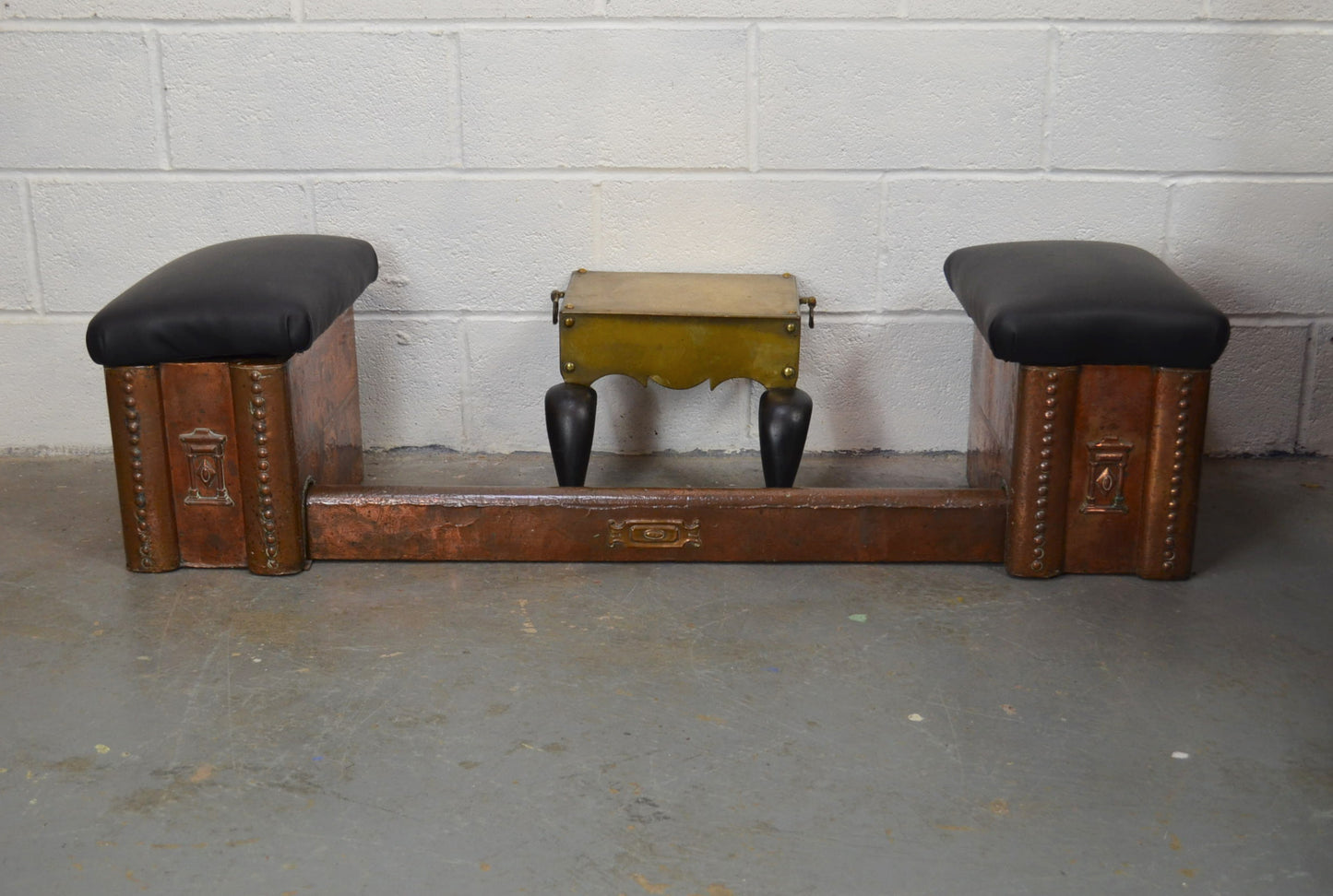 An Arts & Crafts Copper Club Fender With Georgian Footman