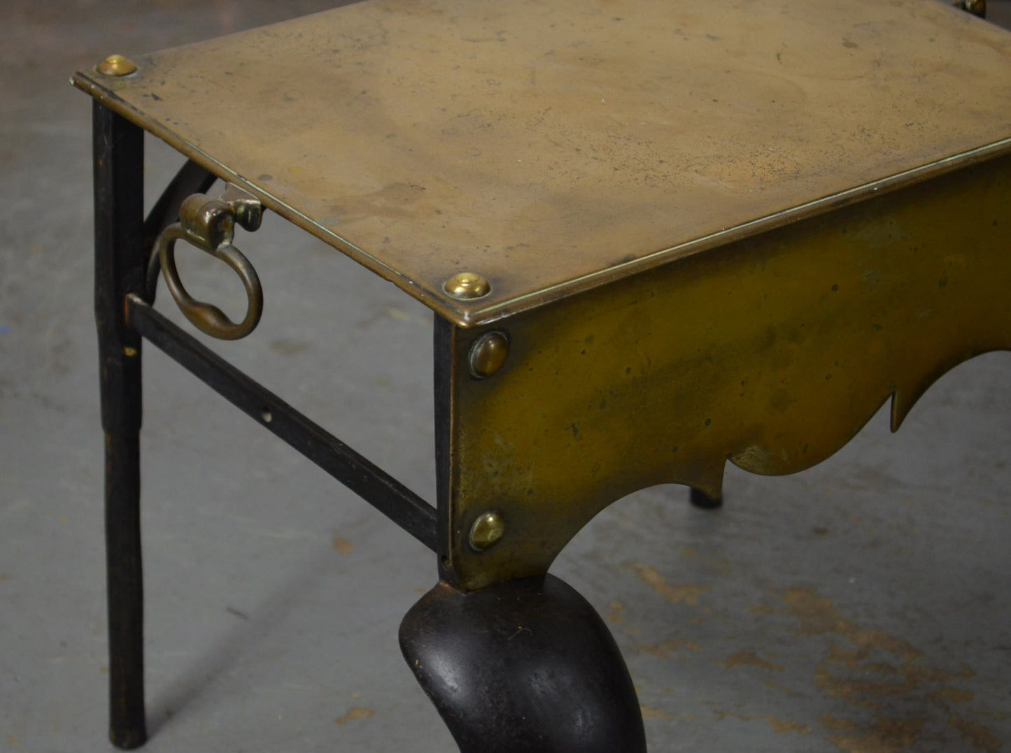 An Arts & Crafts Copper Club Fender With Georgian Footman