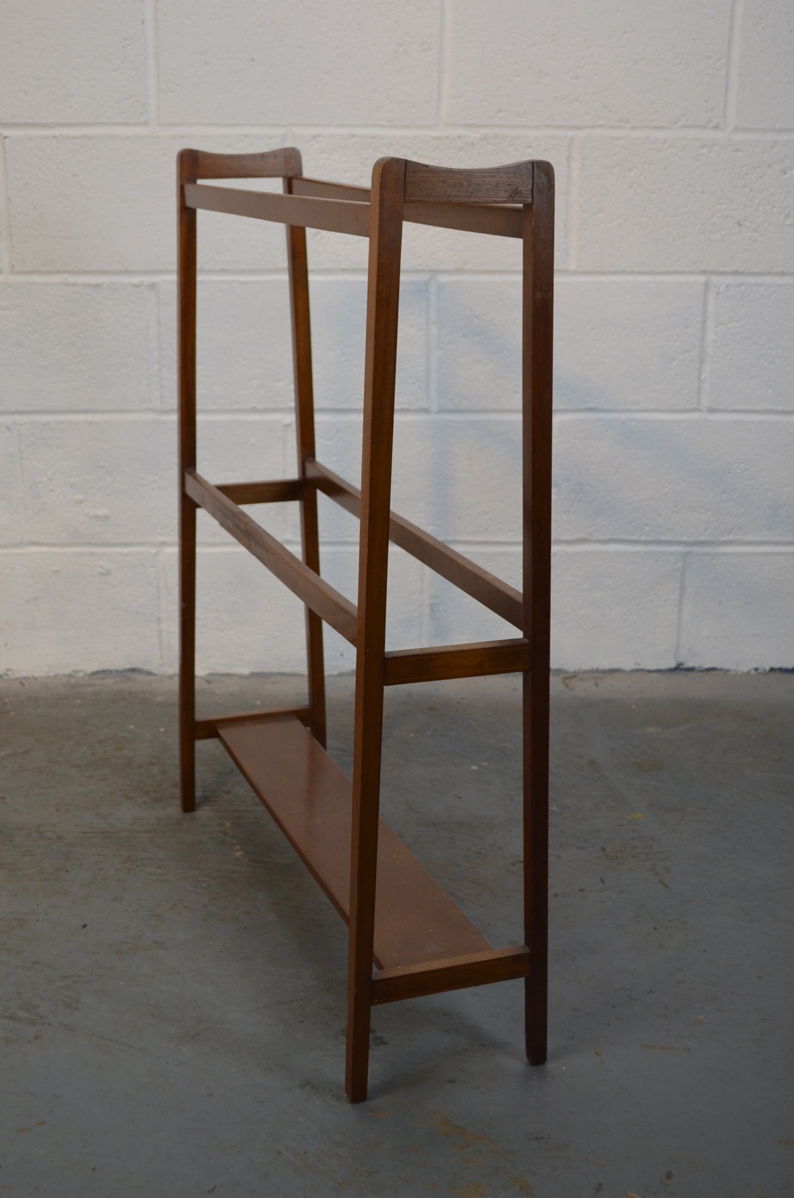 Antique mahogany towel-horse / clothes stand with four rails, square supports with a curved top, displayed against a white background.