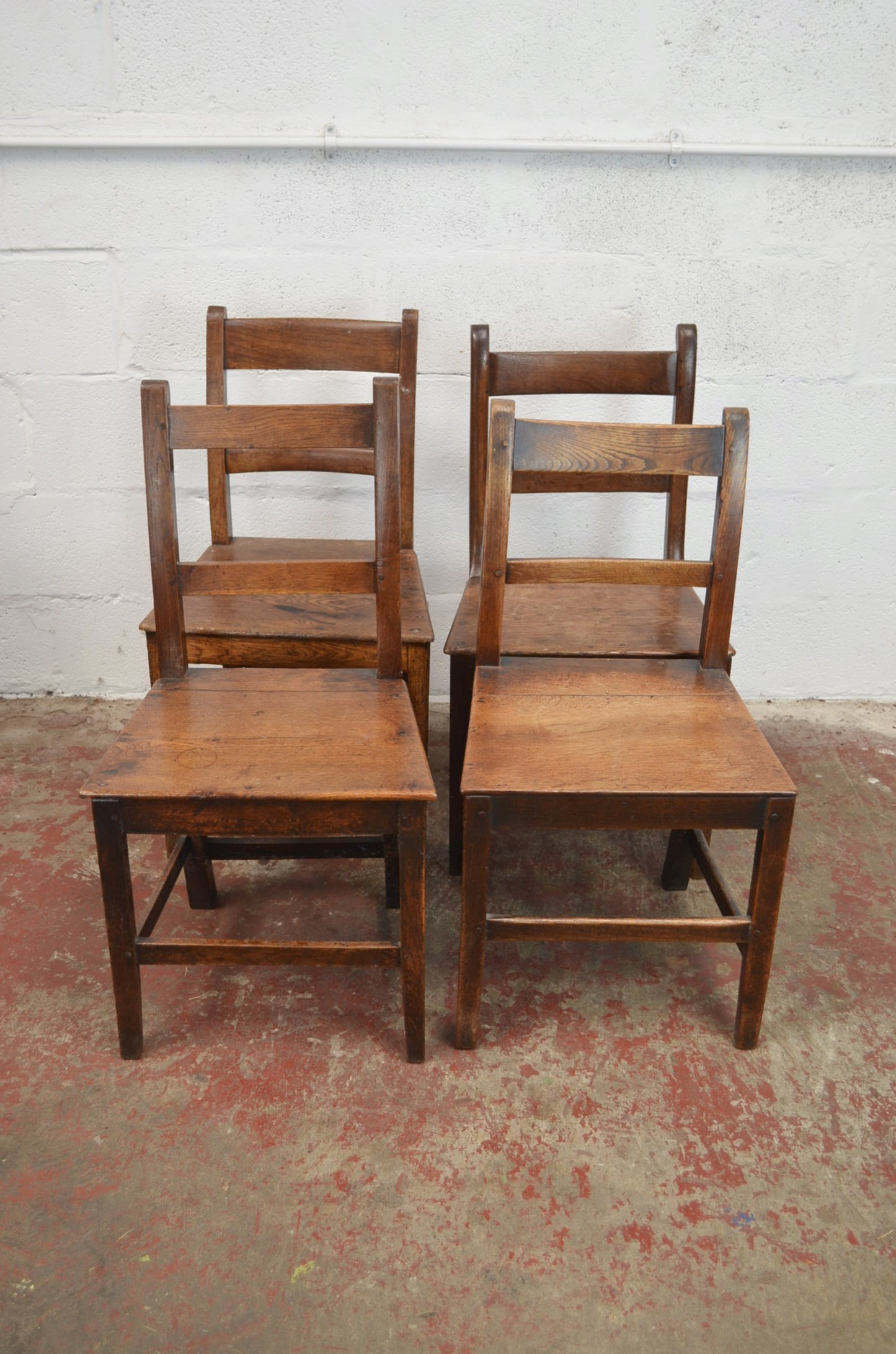 A Set Of Four Georgian Country Cottage Dining Chairs