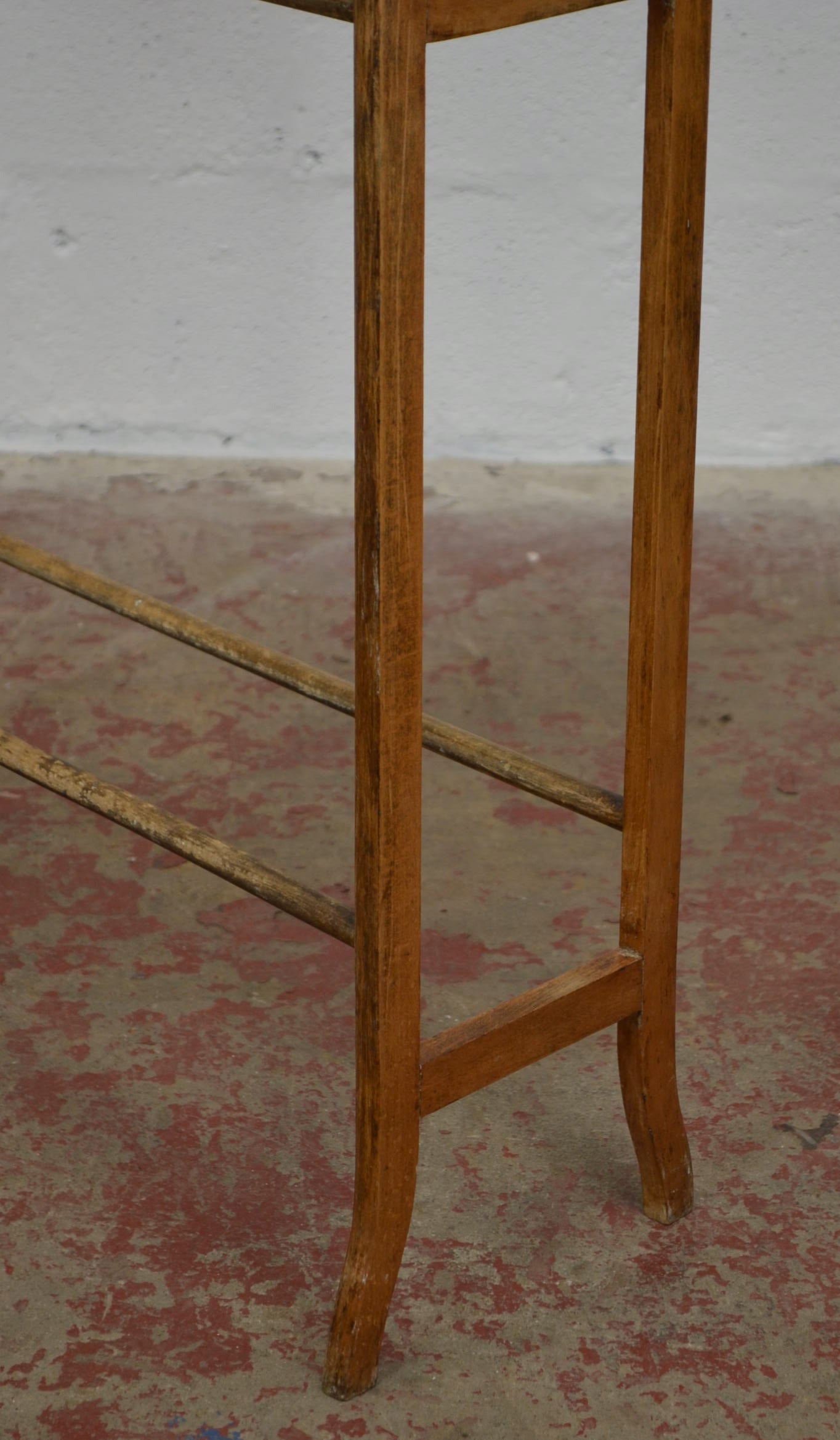 An Antique Towel Rail With Five Supports