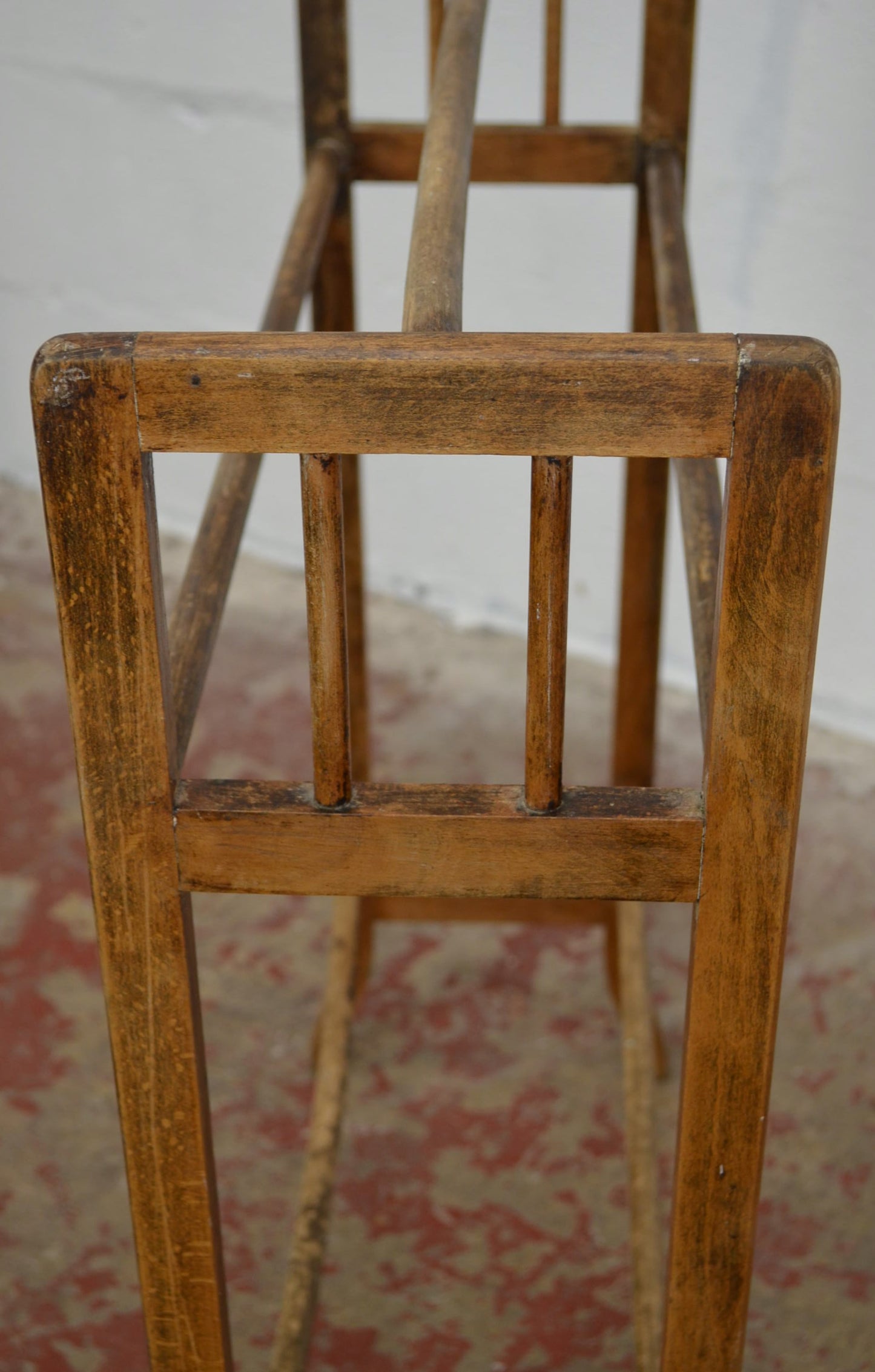 An Antique Towel Rail With Five Supports
