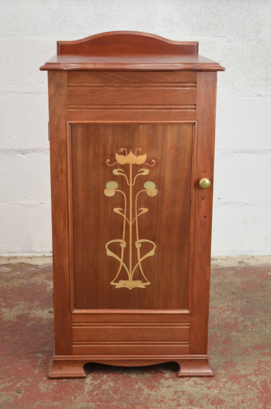 An Art Nouveau Side Cupboard With Flower Door