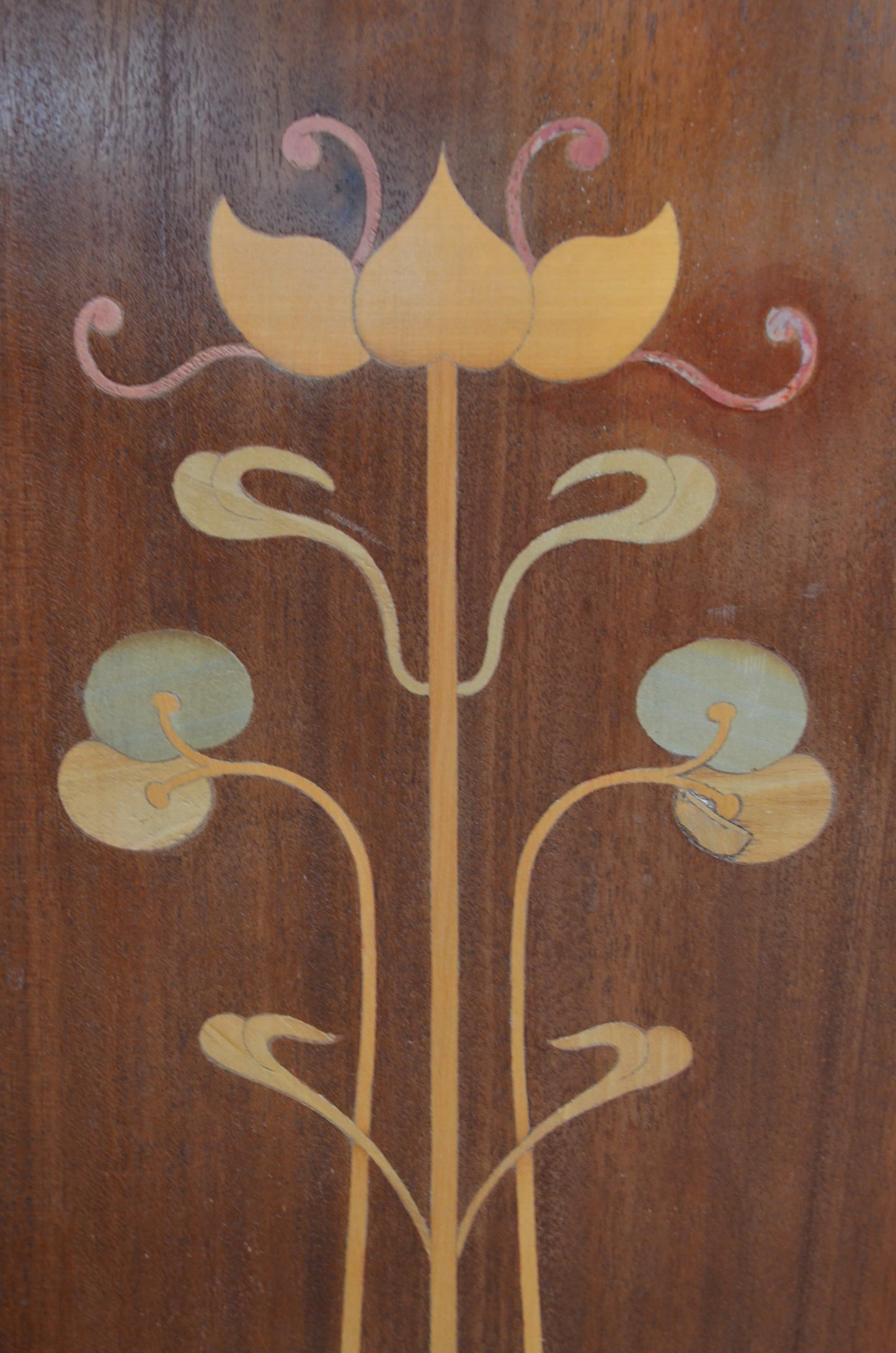 An Art Nouveau Side Cupboard With Flower Door
