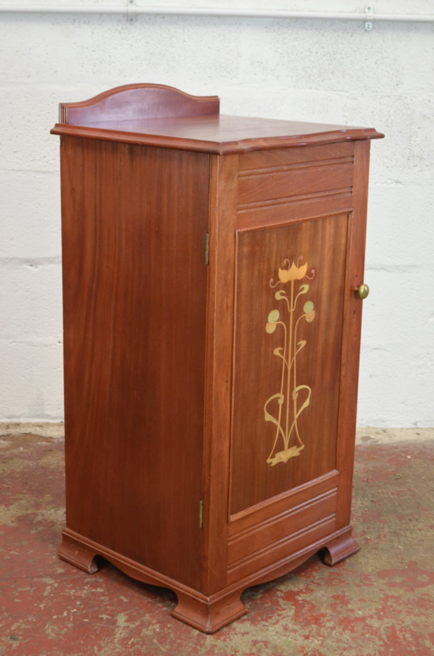 An Art Nouveau Side Cupboard With Flower Door