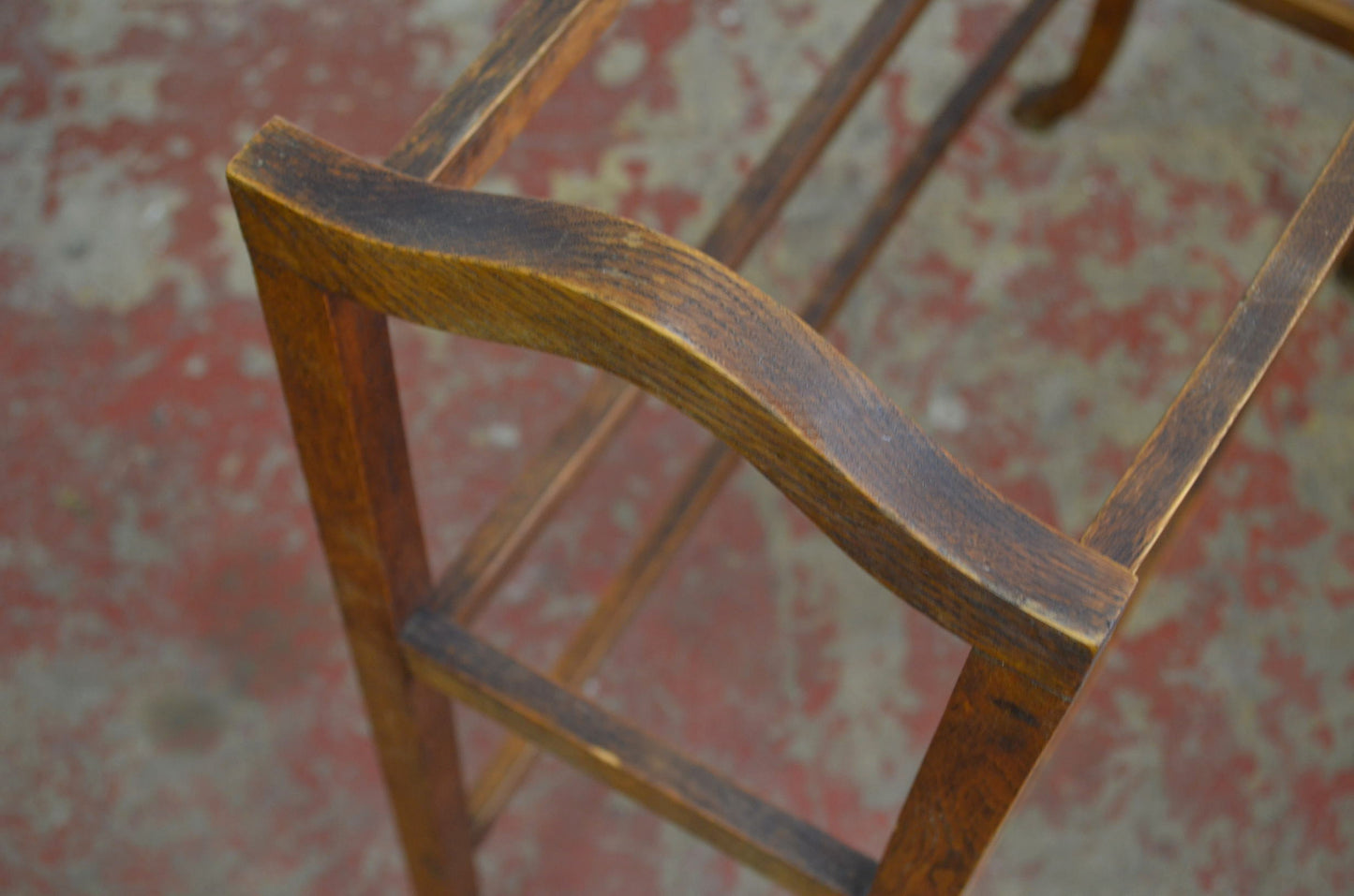 An Antique Towel Rail With Six Supports