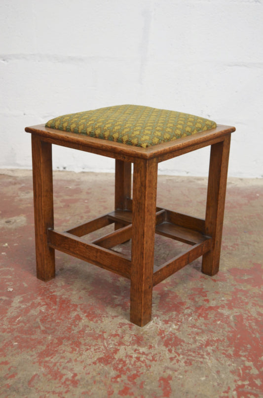 An Arts and Crafts Golden Oak Footstool