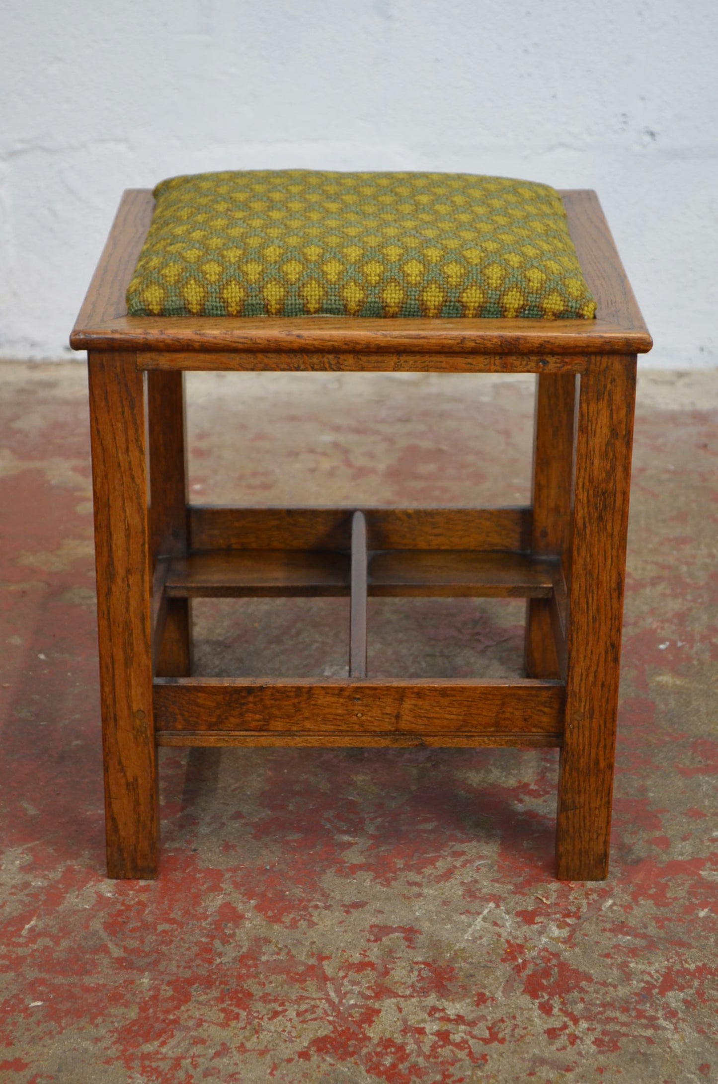 An Arts and Crafts Golden Oak Footstool