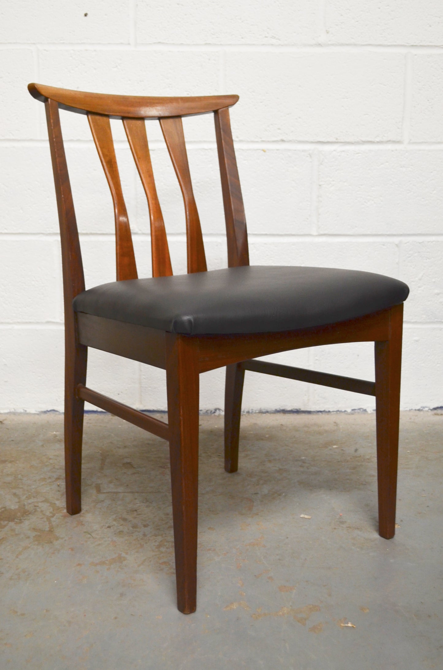 A Set Of Four Vintage Dining Chairs