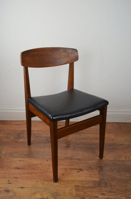 A Set Of Mid Century Dining Chairs
