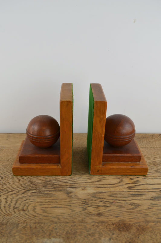 Handmade oak bookends with cricket balls