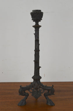 A Pair Of Antique Bronze Candlesticks