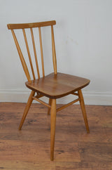 A Pair Of Vintage Ercol Dining Chairs