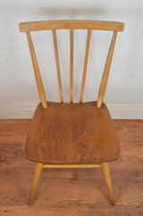 A Pair Of Vintage Ercol Dining Chairs