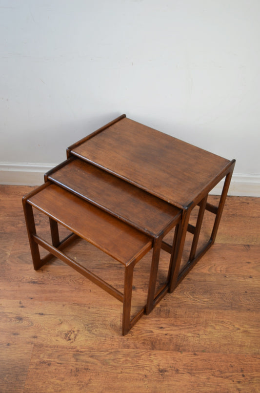 A vintage Arne Hovmand-Olsen for Mogens Kold nest of three teak occasional table of rectangular form.