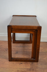 A vintage Arne Hovmand-Olsen for Mogens Kold nest of three teak occasional table of rectangular form.