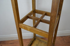 A vintage mid century oak framed Industrial office hall stand