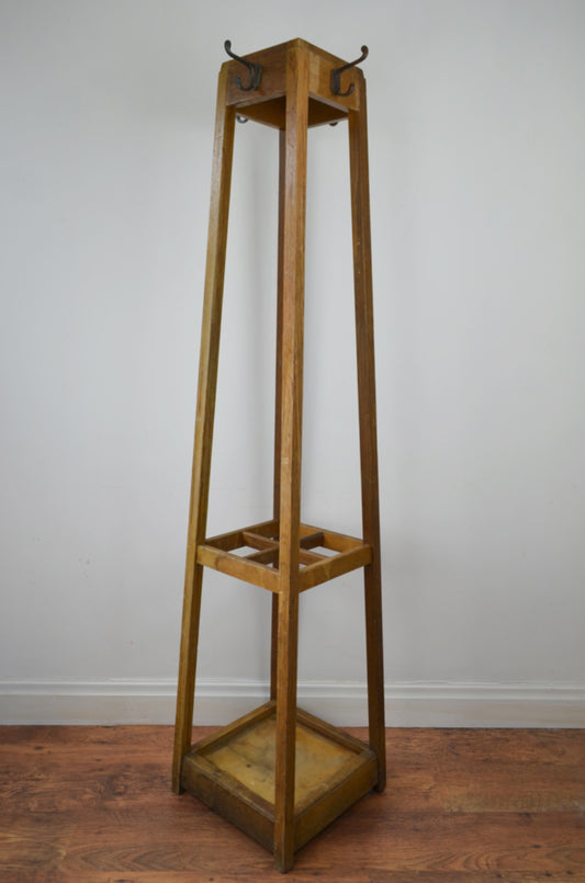A vintage mid century oak framed Industrial office hall stand