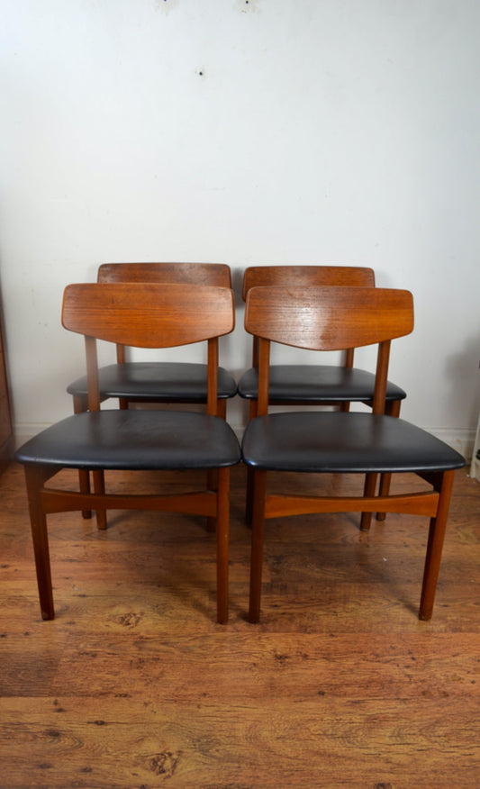 A Set Of Four Vintage Dining Chairs